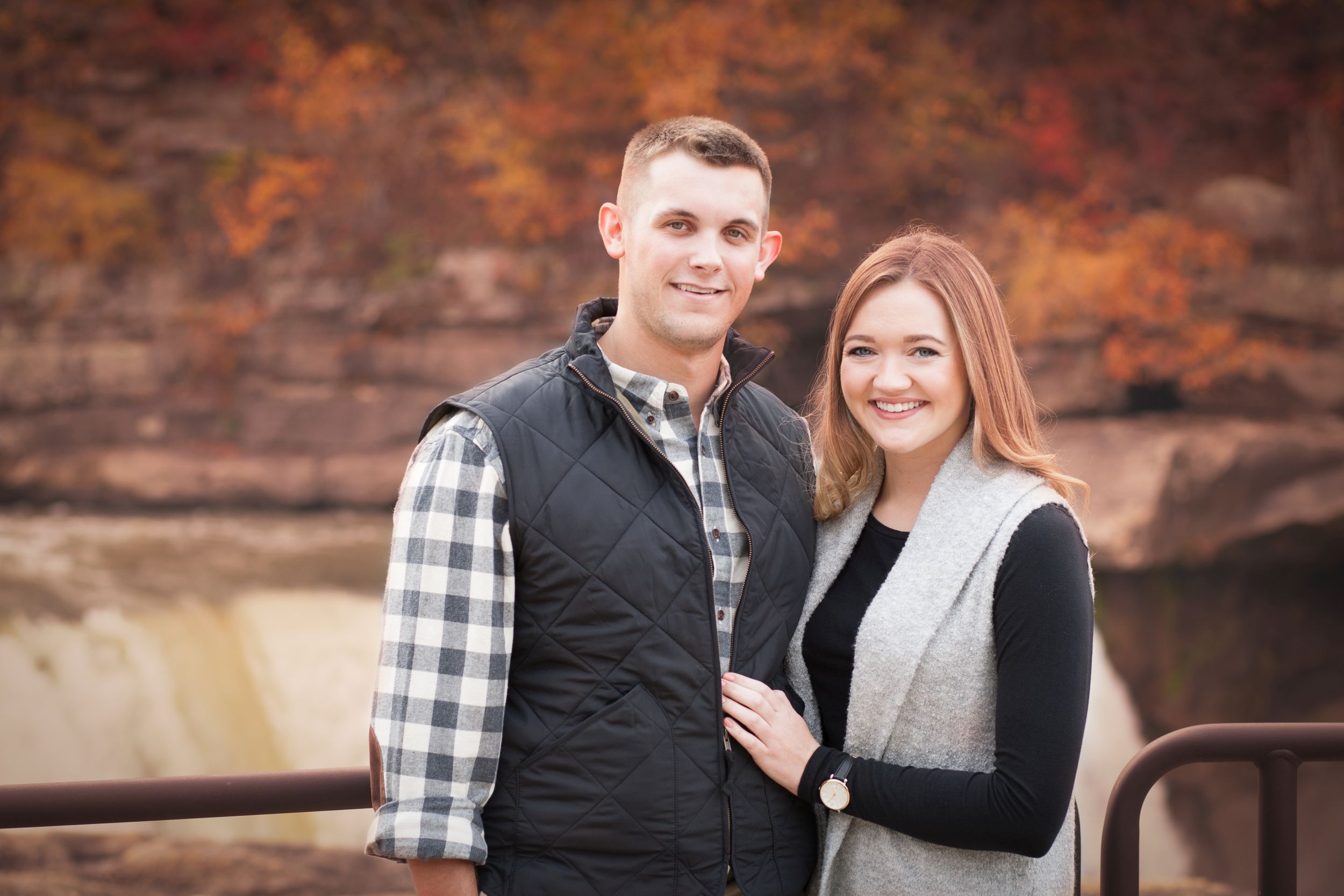 Fiancee and Fiance portrait at Cumberland Falls, Kentucky engagement by Fade To Blaq Photography