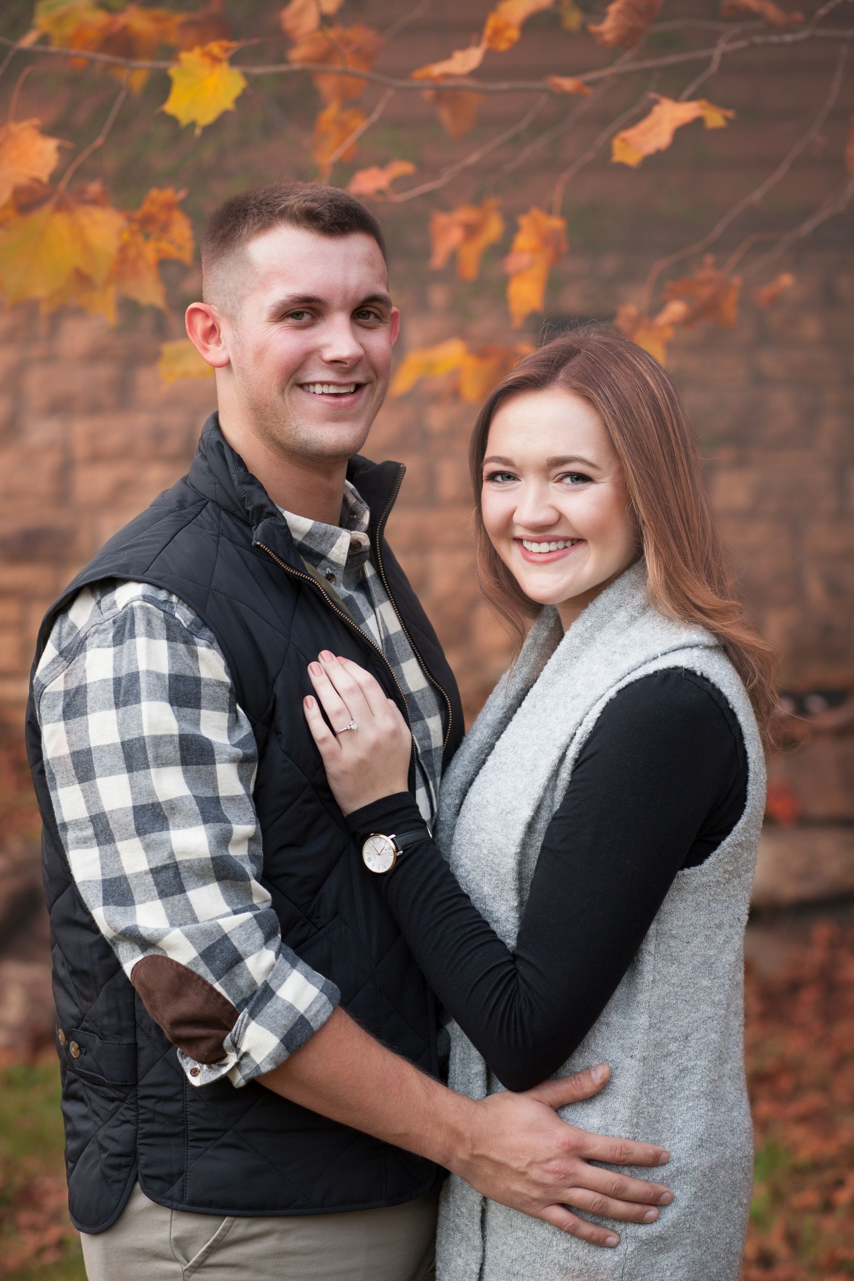 Fiancee and Fiance portrait at Cumberland Falls, Kentucky engagement by Fade To Blaq Photography